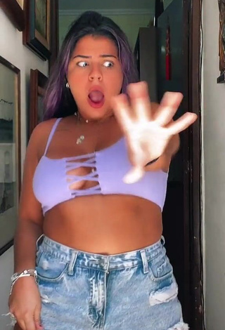 Really Cute Julia Antunes Shows Cleavage in Purple Crop Top