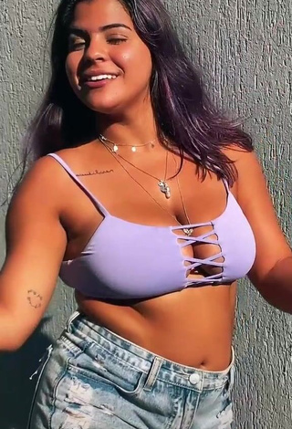 4. Beautiful Julia Antunes Shows Cleavage in Sexy Purple Crop Top