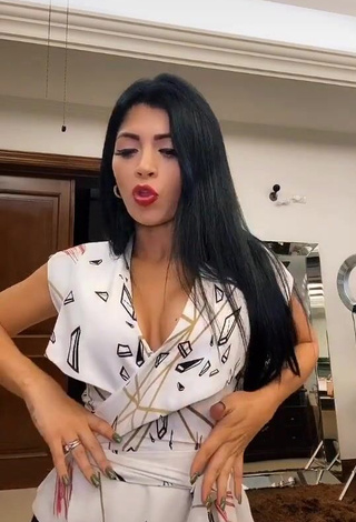 Kimberly Flores Demonstrates Alluring Cleavage