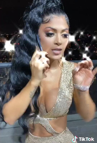 3. Sexy Kimberly Flores Shows Cleavage in Golden Dress