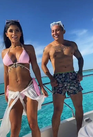 Sexy Kimberly Flores in Pink Bikini Top on a Boat