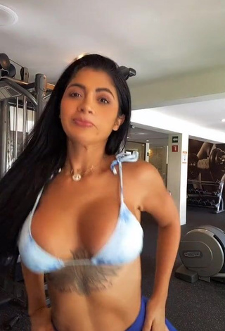 Desirable Kimberly Flores Shows Cleavage in Bikini Top