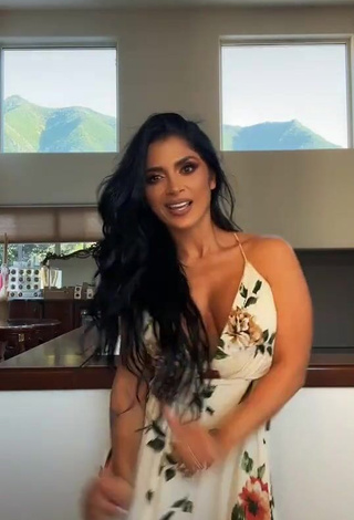 3. Sweetie Kimberly Flores Shows Cleavage in Floral Dress