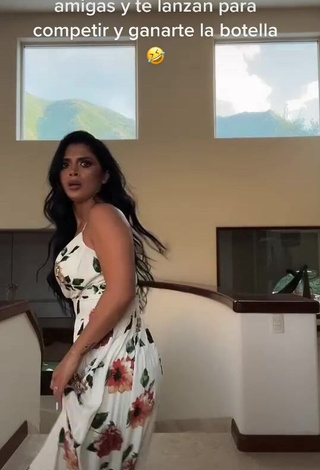 1. Beautiful Kimberly Flores Shows Cleavage in Sexy Floral Dress