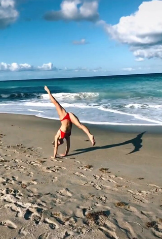 Seductive Olivia Dunne in Red Bikini at the Beach