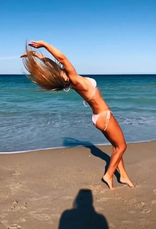 Alluring Olivia Dunne in Erotic White Bikini at the Beach while doing Fitness Exercises