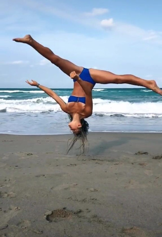 4. Amazing Olivia Dunne in Hot Blue Bikini at the Beach while doing Fitness Exercises