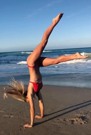 3. Gorgeous Olivia Dunne in Alluring Red Bikini at the Beach