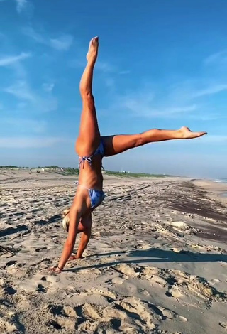 Really Cute Olivia Dunne in Bikini at the Beach while doing Fitness Exercises