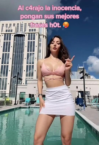 Sexy Andrea Caro Shows Cleavage in Pink Crop Top at the Swimming Pool