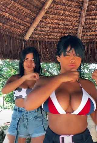 Hot MC Lya Shows Cleavage in Bikini Top