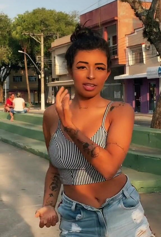 Seductive MC Lya Shows Cleavage in Striped Crop Top