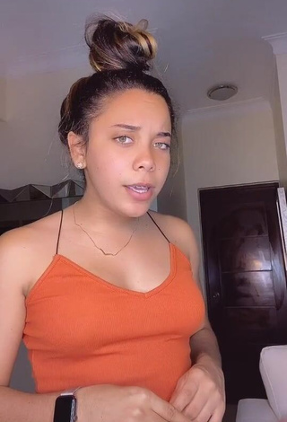 1. Sexy Nallely Santos in Orange Crop Top