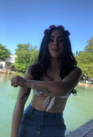 Sexy Ónice Flores Shows Cleavage in Floral Bikini Top in the Sea and Bouncing Big Tits