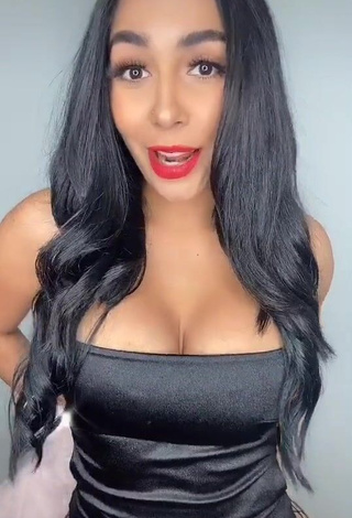 Hot Pao Castillo Shows Cleavage in Black Bodysuit