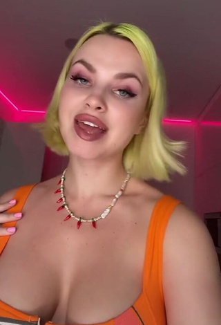 Sweetie Rasa Shows Cleavage in Crop Top