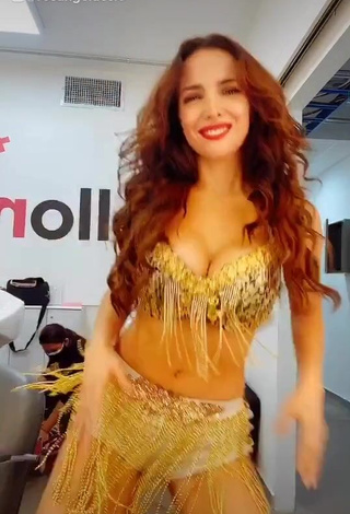 1. Sexy Rosángela Espinoza Shows Cleavage in Golden Bra