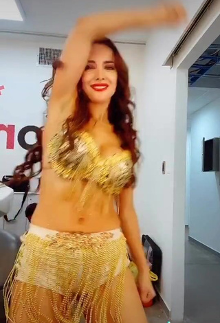 3. Sexy Rosángela Espinoza Shows Cleavage in Golden Bra