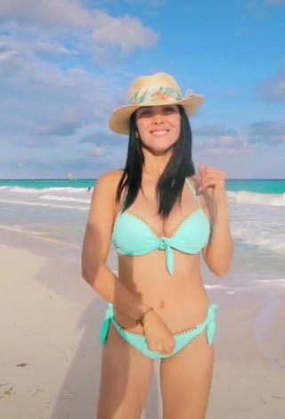 1. Sensual Rosángela Espinoza Shows Cleavage in Blue Bikini at the Beach and Bouncing Big Boobs