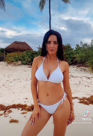 4. Seductive Rosángela Espinoza Shows Cleavage in White Bikini at the Beach