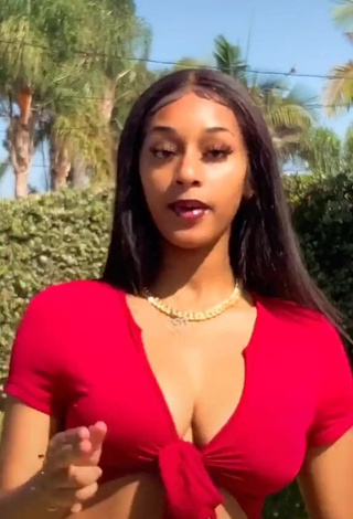 Desirable Sharan Jones Shows Cleavage in Red Crop Top and Bouncing Boobs