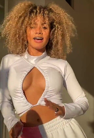 Beautiful Sandra Costa Shows Cleavage in Sexy White Crop Top