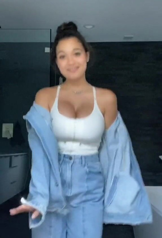 Sexy Sofia Gomez Shows Cleavage in White Top and Bouncing Big Breasts