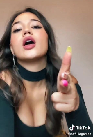 4. Hot Sofia Gomez Shows Cleavage in Black Top