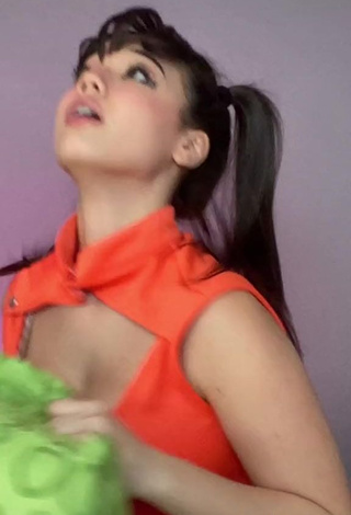 3. Hot Sofia Gomez Shows Cleavage in Orange Dress and Bouncing Big Tits