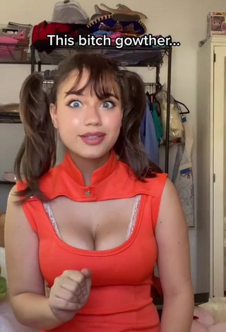 1. Beautiful Sofia Gomez Shows Cleavage in Sexy Orange Dress and Bouncing Big Boobs