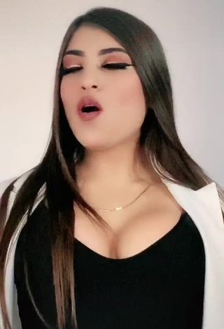 Hot Andrea Zúñiga Shows Cleavage in Black Top