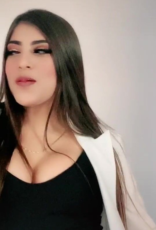 4. Hot Andrea Zúñiga Shows Cleavage in Black Top