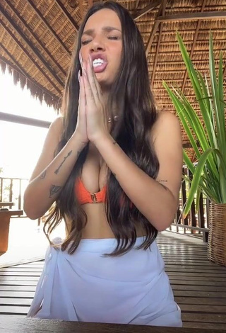 1. Hot Stéfani Bays Shows Cleavage in Orange Bikini Top