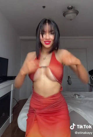 3. Hot Christina Kalamvokis Shows Cleavage in Red Dress (Underboob)