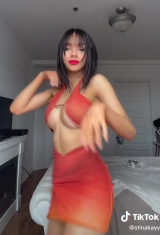 4. Hot Christina Kalamvokis Shows Cleavage in Red Dress (Underboob)