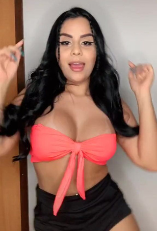 Sexy Tati Nunes Shows Cleavage in Orange Bikini Top