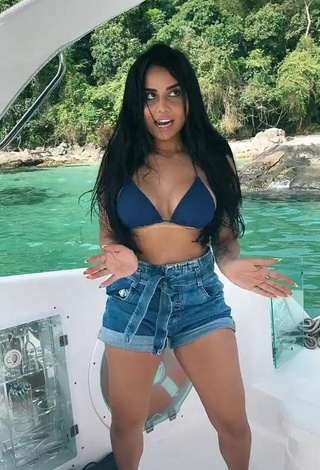 Desirable Tati Nunes in Blue Bikini Top on a Boat and Bouncing Breasts (Underboob)