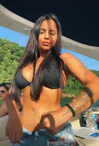 Amazing Tati Nunes in Hot Black Bikini Top on a Boat and Bouncing Boobs