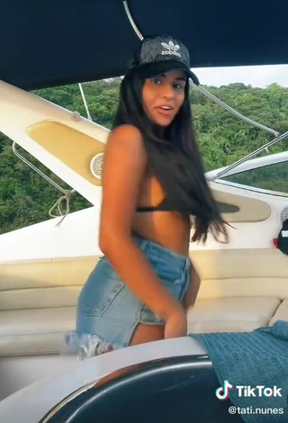 Sweetie Tati Nunes Shows Cleavage in Black Bikini Top on a Boat