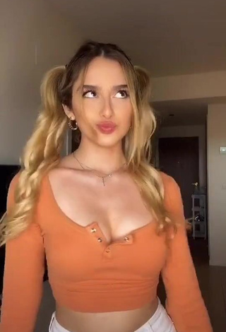 Attractive Teressa Dillon Shows Cleavage in Orange Crop Top and Bouncing Boobs