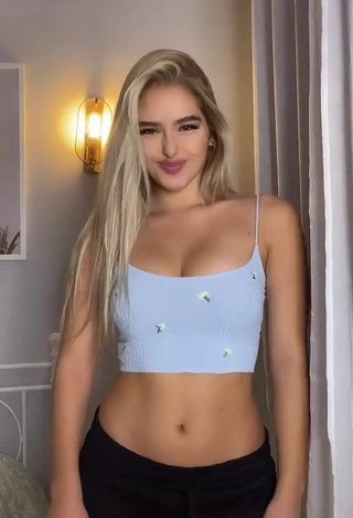 1. Alluring Teressa Dillon Shows Cleavage in Erotic Blue Crop Top and Bouncing Tits