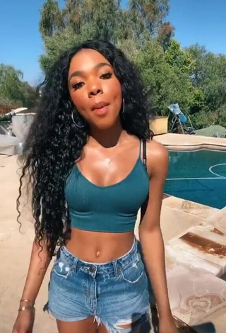 1. Amazing Teala Dunn in Hot Turquoise Crop Top at the Pool