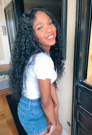 Desirable Teala Dunn Shows Cleavage in White Top