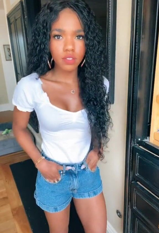 4. Desirable Teala Dunn Shows Cleavage in White Top