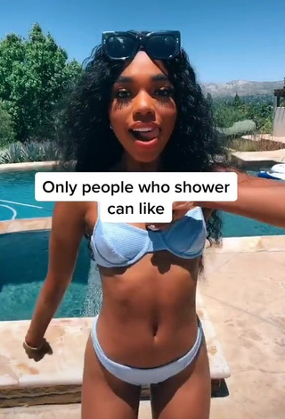 1. Magnetic Teala Dunn in Appealing Blue Bikini at the Swimming Pool