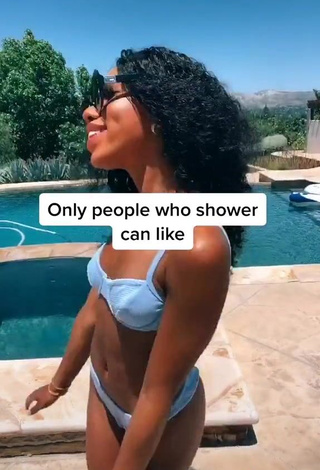 4. Magnetic Teala Dunn in Appealing Blue Bikini at the Swimming Pool