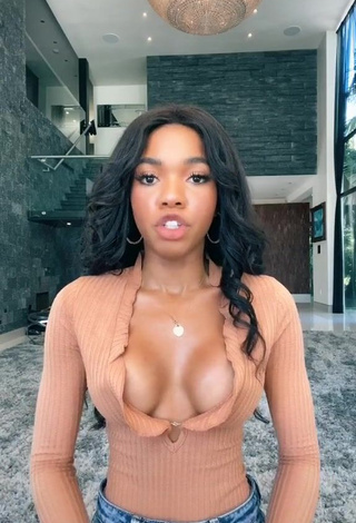 1. Hot Teala Dunn Shows Cleavage in Peach Top