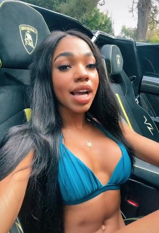 1. Sexy Teala Dunn Shows Cleavage in Blue Bikini Top in a Car