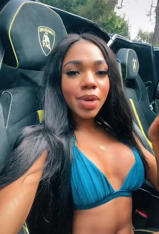 Sexy Teala Dunn Shows Cleavage in Blue Bikini Top in a Car