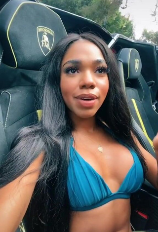 3. Sexy Teala Dunn Shows Cleavage in Blue Bikini Top in a Car